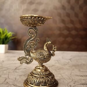 Buy Brass Fine Art Peacock Holding Diya 5″ Antique Showroom Trichy
